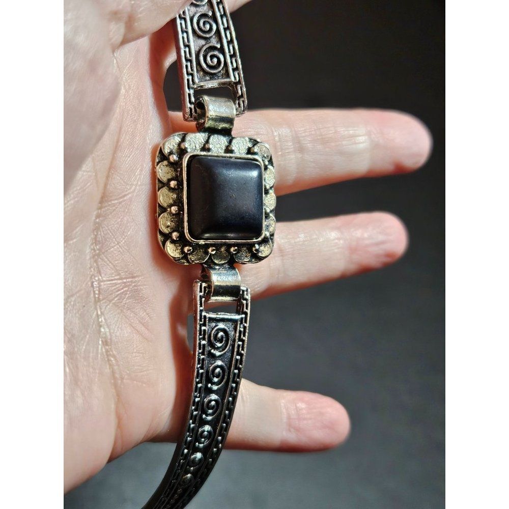 Silver tone black semiprecious stone bracelet up to 8.25"
